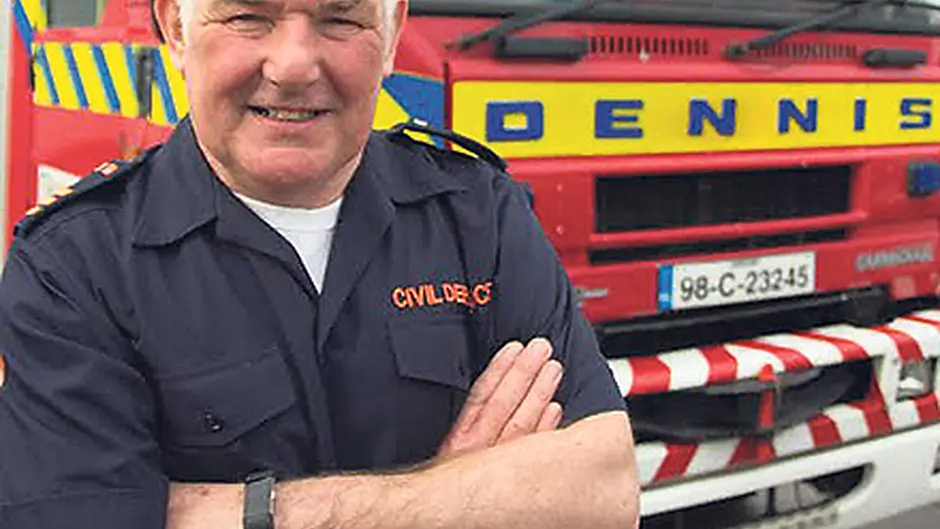 John is honoured for his 43 years with Civil Defence Image