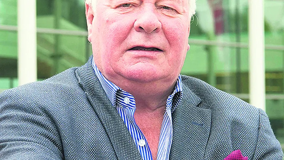 Carroll gets district chair after tight vote Image