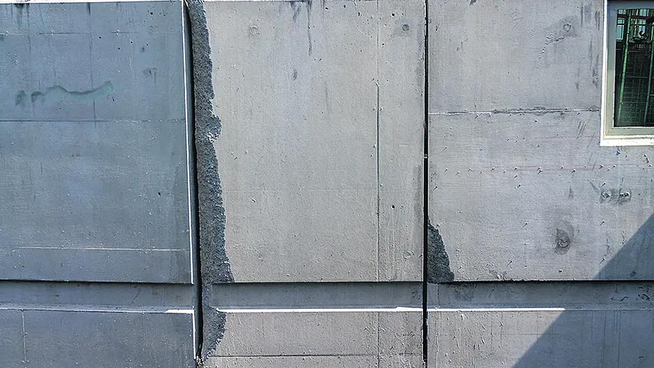 Flood relief walls already under repair Image