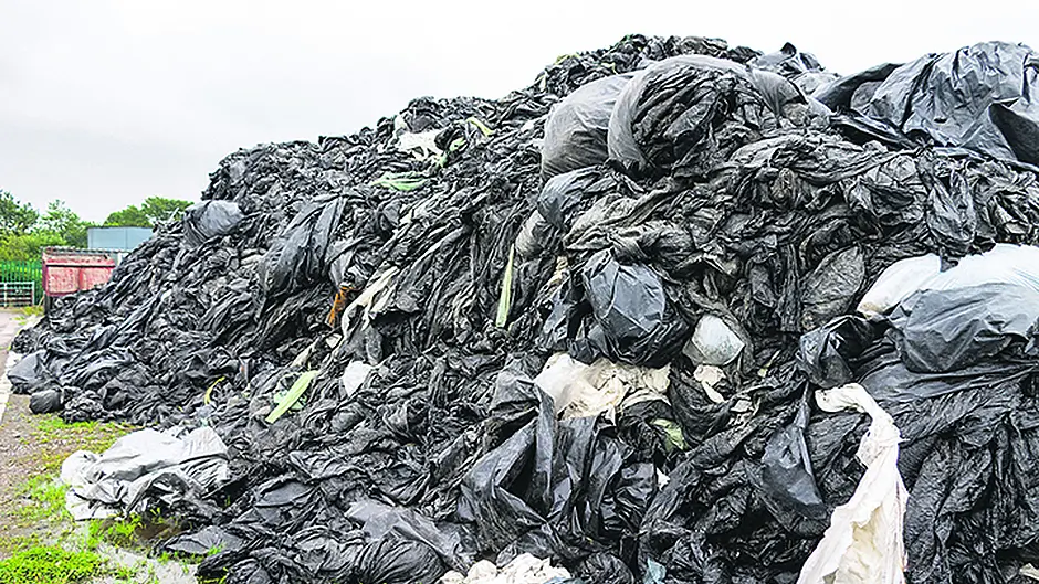 What do farmers do with their plastic? Image