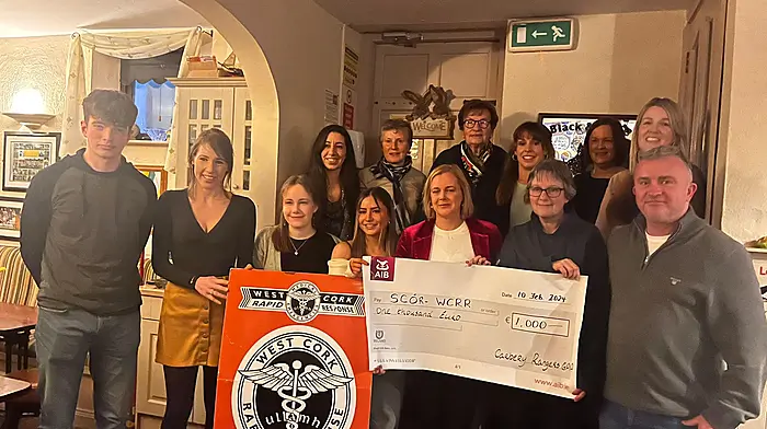 The Carbery Rangers RossSync winners presenting their cheque of €1,000 to their chosen charity, West Cork Rapid Response.