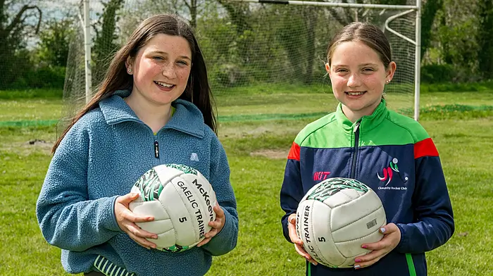 Siblings Faye and Kerri Gleeson from Ballineen were interested in the GAA club’s stand at the club day which was hosted by Beda last Saturday. (Photo: Andy Gibson)