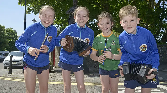 Members of the Clonakilty Comhaltas group, Erin Coppinger, Aine Deiseach, Mairead NÍ Lochlain and Liam Peppard in Emmet Square at the launch of the Cork County Council Special Music Event Scheme 2024.   (Photo: Denis Boyle)