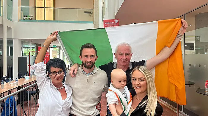 Sinn Féin's newest councillor, Eoghan Fahy, second from left,. celebrating taking the sixth seat in Carrigaline at County Hall with, from left: Audrey Fahy, John Fahy, Rían Fahy and Melanie McCarthy.