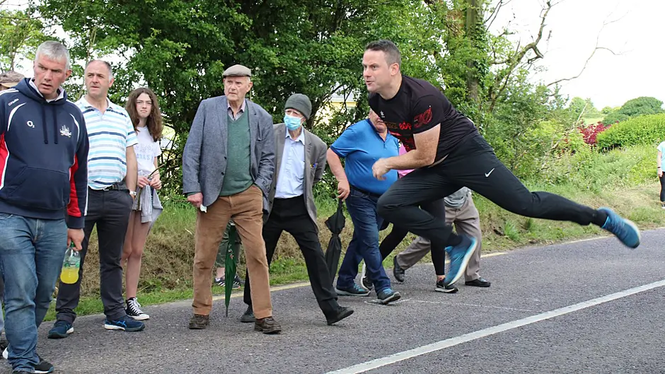 Martin Bohane jumps his first hurdle in senior men's championship Image