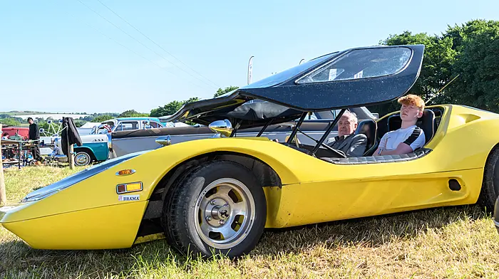 Jim and Tiernan Kelly (Enniscorthy, Co. Wexford) with their Nova kit car, one of only 300 made at the 27th Annual Innishannon Steam & Vintage Rally in aid of the Irish Cancer Society which has raised €1.5 million since 1997.
Picture: David Patterson, Tractor Run – Cork