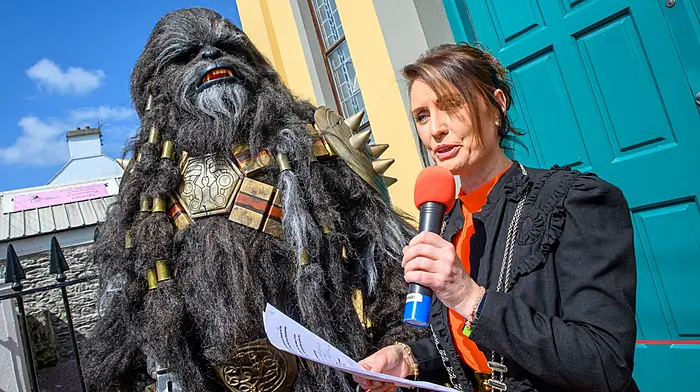 Deputy county mayor Cllr Deirdre Kelly opening the event with Wookie bounty hunter Krrsantan from the Reel Icons cosplay group at the Dunmanway Feel the Force Star Wars festival which was held over the June bank holiday weekend.  (Photo: John Allen)