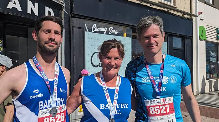 Brian Begley, Fiona Begley and Danny Manning from Bantry Athletic Club participating in the Cork City Marathon.