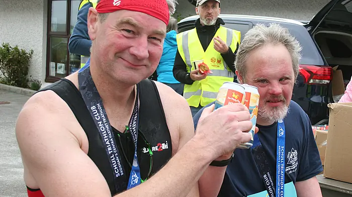 Tim O'Sullivan, Cork Tri Club relaxing with Fineen McCarthy, Schull after the Brosnan's Centra Fastnet Triathlon in SchullPic by Terry AttridgeNo Reproduction Fee