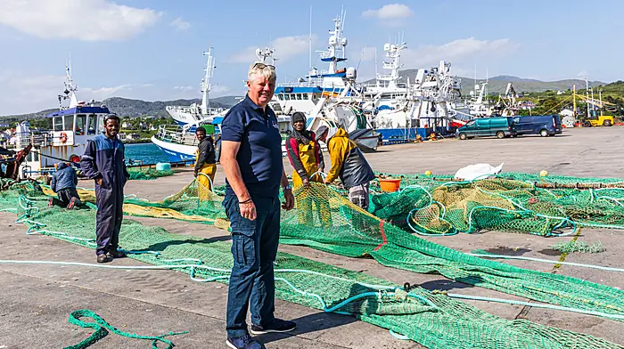 Denis Whelan and his crew getting their nets ready for their next trip to sea.   (Photo: Anne Marie Cronin)