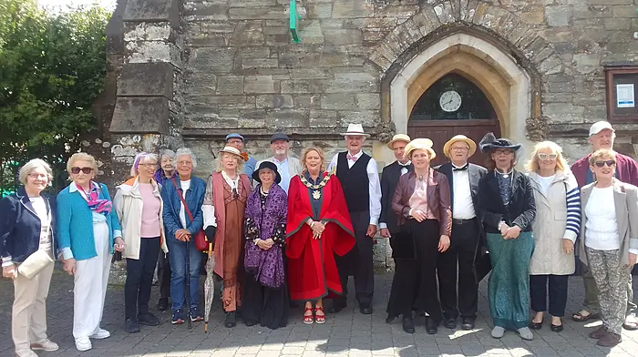 Kata Bielska of the Cope Foundation took a photo of the newly commissioned mayor, Eileen Sheppard, with Philip Joyce (grandnephew of James Joyce) to her right, along with residents and friends of the Cope Foundation outside the post office at the commencement of their Bloomsday walkabout on Sunday June 16th.