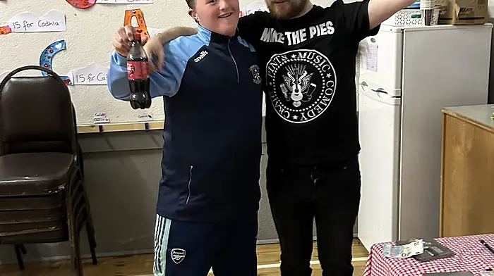 Gaggin Community Hall hosted singer songwriter George Murphy (right) in concert recently and Jack Peterson Harrington was the lucky winner of concert tickets.