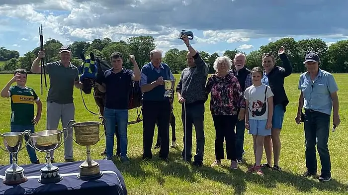 Liam O’Brien, owner of racehorse Christy Brown, celebrated winning the Mick Twomey and Donie Barry Cup at the Old Chapel memorial races held in Lyre last Sunday. From left: Rian Hayes, Mike Healy, Conor Hurley (trainer) and Tony Quinlan presenting the cup to Liam O’Brien, Betty O’Brien, Connie O’Mahony, Ciara Harrington, Mags Harrington and Connie O’Sullivan. The winning driver, Michael O’Mahony, is missing from the photo.