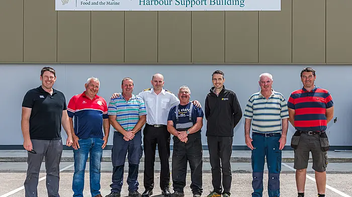 Seamus Mullins has been working in his local harbour of Castletownbere for several years and is wished all the very best on his retirement. From left: Joe McCarthy, Paul Nee, Brian O’Shea, Martin Mylotte,  Seamus Mullins, Gerome McCarthy, Tony Harrington and Alan Sullivan. (Photo: Anne Marie Cronin)