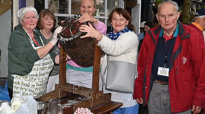 Butter making during the Old Time Fair in Clonakilty with (left to right): Ann Hayes, Ann Hourihane, Liz O’Sullivan, Brigid McCarthy and Fachtna O’Callaghan.  Photo: Martin Walsh.