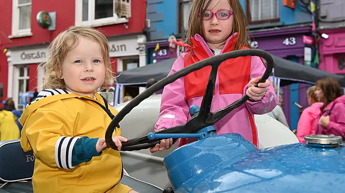 Local children Sam Óg and Ciara Kingston at the Old Time Fair in Clonakilty.  Photo: Martin Walsh.