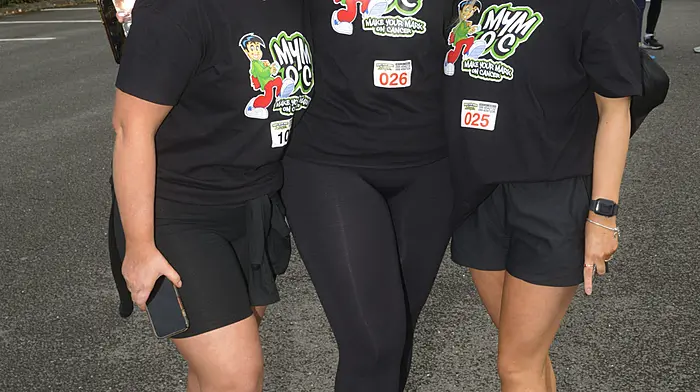 Grainne Looney, Kate McCarthy and Stevi McGrath taking part in the Makeyourmark on Cancer walk. (Photo: Denis Boyle)