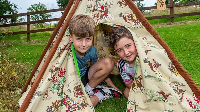 Ollie Jennings from Reenascreena and Cathal Buttimer from Cahermore having fun at the annual Rosscarbery garden fete which was held recently at the deanery.  (Photo: Andy Gibson)