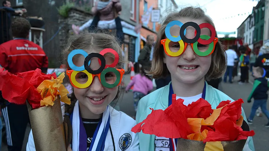 Vivienne McCarthy, Caheragh and Méabh Gough on fire with their Olympic flames at the Skibbereen Festival Street Party last Friday evening. Photo; Anne Minihane.