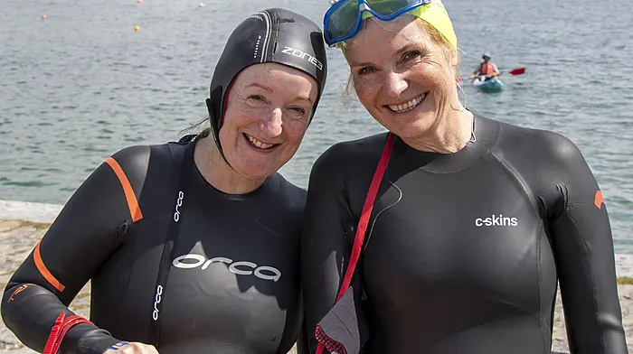 Siobhan Cronin and Blanaid O'Regan ready to start their swim at Keelbeg Pier where about 200 swimmers recently took to the water in support of the Union Hall RNLI.  (Photo: Andrew Harris)