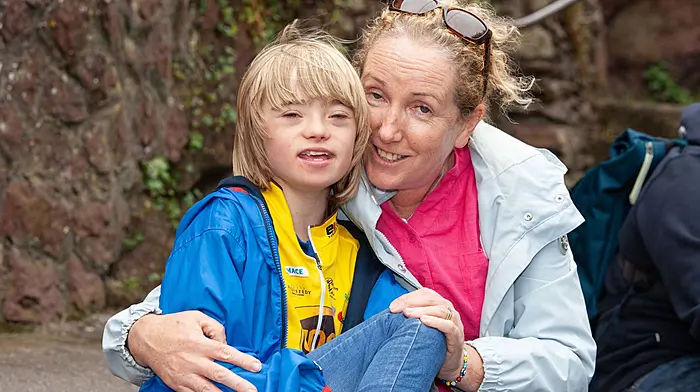Oisin (11) and Mary Kelleher from Macroom at the end of the 2024 Tour de Munster Charity Cycle which was held on Patricks Hill, Cork City last Sunday. Cyclists completed the epic four-day, 600 km route across Munster raising vital funds for the Munster branches of Down Syndrome Ireland and were joined by cycling legend Sean Kelly.  (Photo: Diane Cusack)