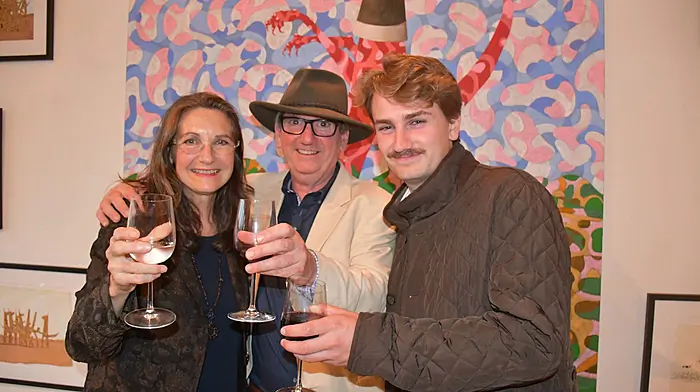 Artists Christina Todesco Kelly and John Kelly with their son Oscar at the opening night of the exhibitions at Cnoc Buí in Union Hall. (Photo: Anne Minihane)