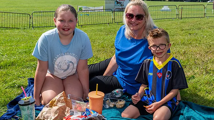 Picnic time at the the harness racing In Lyre last Saturday for Abigail,
Sinead, and Dillon Sheehy from Baltimore (Photo: Andy Gibson)