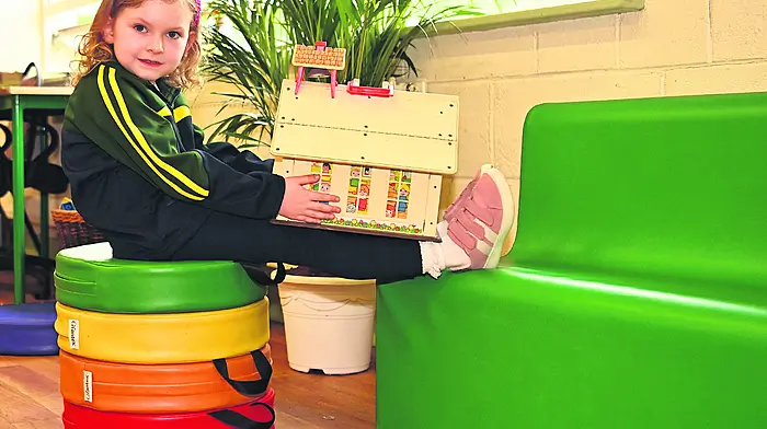 Aoibhinn O’Donovan-Uhl sitting pretty on her first day at Ardfield National School.  (Photo: Martin Walsh)