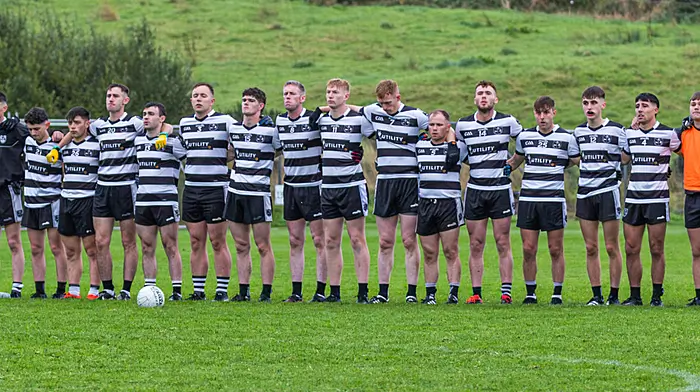 It was an emotional day when the Castletownbere team held a minute of silence to remember their player Dave Fenton, rip, ahead of their McCarthy Insurance premier intermediate championship against Rockchapel. (Photo: Anne Marie Cronin)