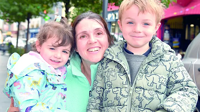 Susan Fitzpatrick, Clonakilty with her children Lily and Luke Dowling posing for a photograph in Pearse Street.  (Photo: Martin Walsh)