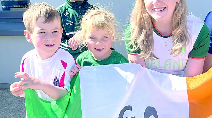 Olympian Aoife Casey with her cousins Daniel and Annie Casey and Iarla O’Cathasaigh at Rath National School when she recently visited the school with her Irish teammates Emily Hegarty and Fintan McCarthy.