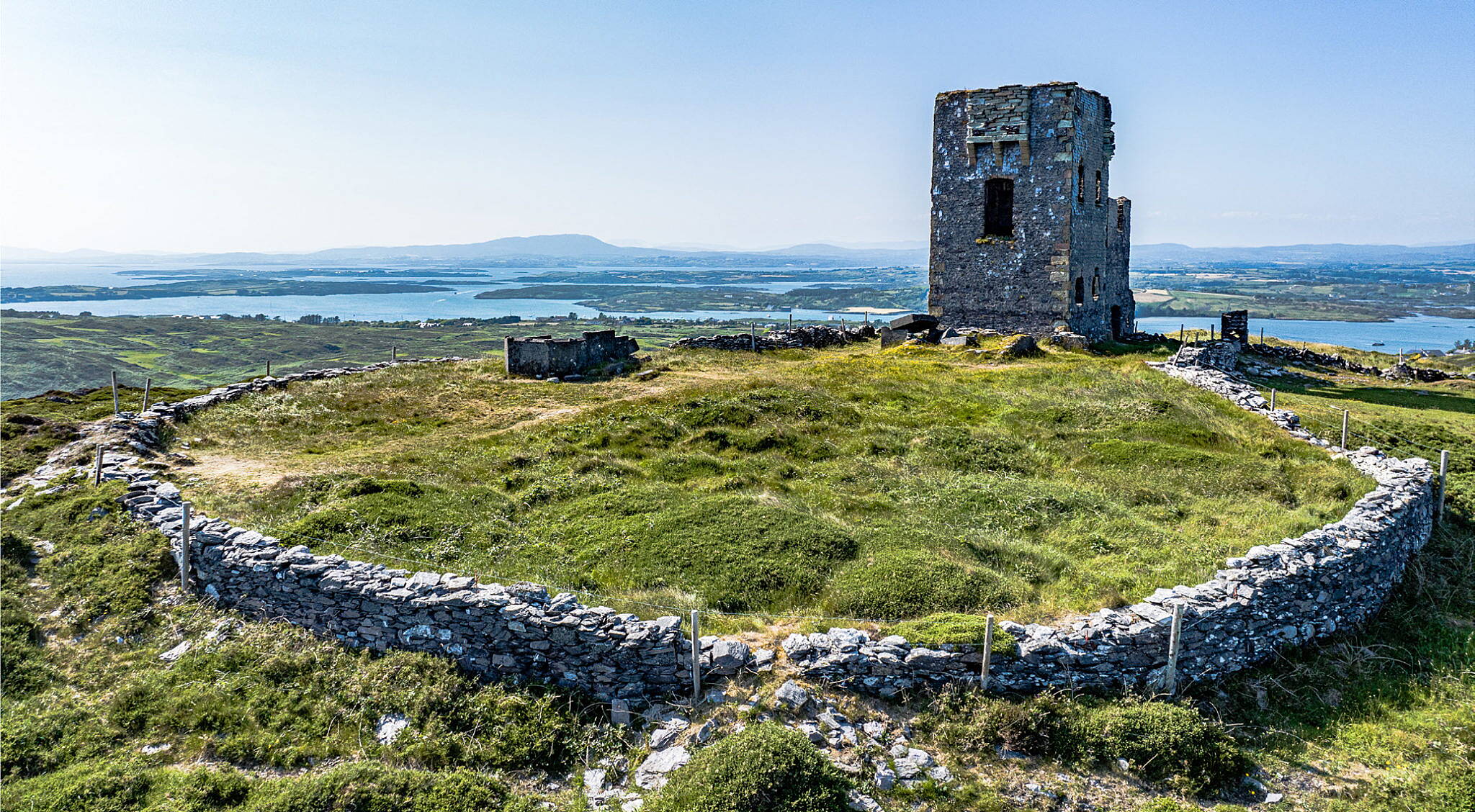 Spain Tower near Baltimore, with Roaringwater Bay and the Mizen peninsula in the background.