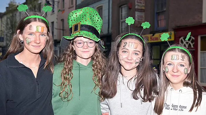 At the St. Patrick’s Day Parade in Clonakilty were Anna Kenneally, Lily Boddington, Cassie O’Donovan and Meabh Lowney.  Right: In Dunmanway were Grand marshal Kathleen O’Farrell, Cllr Deirde Kelly and Grand Marshal Eileen Lyons. (Photo: Martin Walsh & David Patterson)