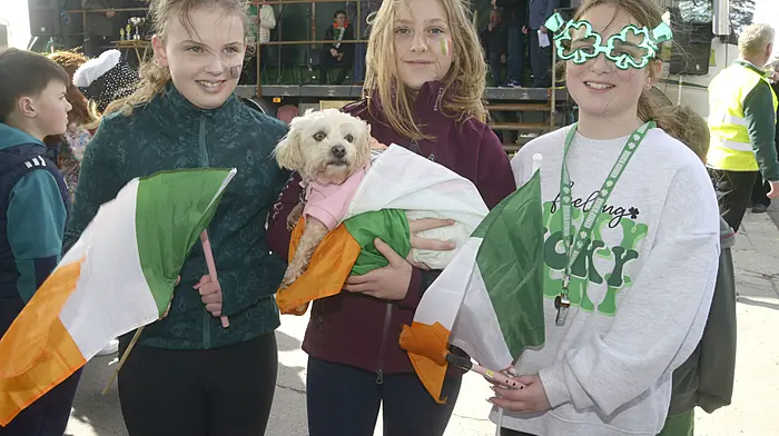 NEWS 17/3/2024 Pictured at the St Patricks day parade at Coppeen Co Cork was Isabel Doyle, Sadhbh Fehily and Kate Murray with max. Picture Denis Boyle