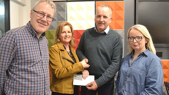 Artist Monica Jones making a presentation to William Kingston, President Skibbereen Lions Club from her recent exhibition at the Ludgate Hub also included are Dan Cleary, Hon. Treasurer and Elma Connolly, Hub Manager. Photo; Anne Minihane.Monica Jones, an artist living in Baltimore, presenting a cheque for €700 from the proceeds of the sale of some of her paintings, to Skibbereen Lions Club president William Kingston. Also pictured is Dan Cleary (Skibbereen Lions Club treasurer) and Elma Connolly, Hub Manager at Ludgate who gave space for Monica to exhibit her paintings.