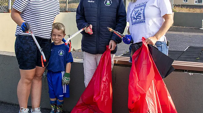 Imelda O’Sullivan, Claire O’Mahony, Mary Hallihane and Daniel O’Sullivan with their litter pickers and bags in support of Castlehaven GAA’s recent community clean-up day.     (Photo: Andrew Harris)