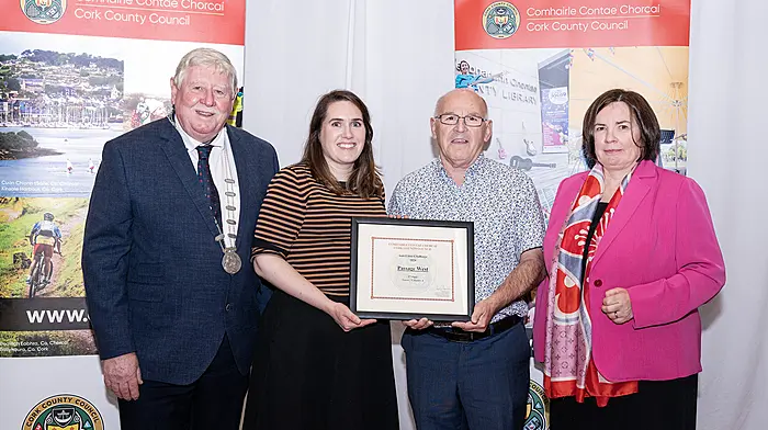 Grainne Crowley and John Daly, representatives from Passage West, who were placed second in Category A at the Cork County Council’s annual Anti-Litter Challenge, with deputy mayor Martin Coughlan and chief executive Moira Murrell.(Photo: Gerard McCarthy)