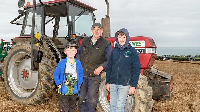 JT and Michael O'Driscoll from Kilbrittain with their grandad Jackie O'Driscoll from Knockbrown, Bandon enjoying their day at the Clonakilty ploughing match, held on the lands of the Wolfe family, Ardgehane, Timoleague. (Photo: David Patterson)