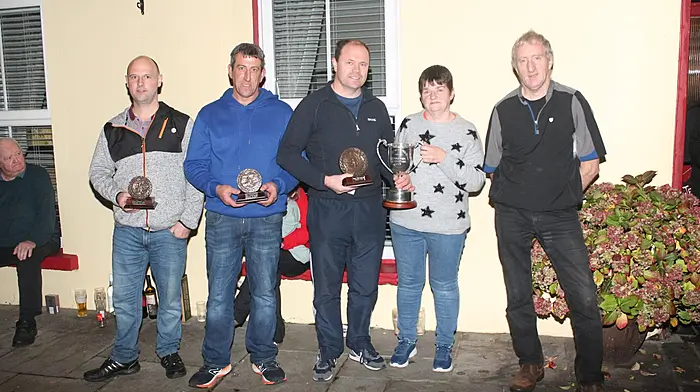 At the John O’Driscoll road bowling cup final in Durrus were (from left): Finbarr Coughlan (runner up), Pat Daly (runner up),  Kevin Minehane (winner), Mary O’Donovan and Donal O’Mahony (referee).