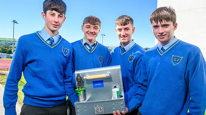 KCS 5th Year students Seán Dinneen,  David Forde,  John Quinn and Jack Good with the Farm Equipment Holder they developed while in Transition Year. Their ingenuity was rewarded with a monthly award in The Southern Star and Celtic Ross West Cork Farming Awards this year. (Photo: John Allen)
