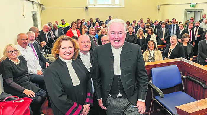 Clonakilty courthouse was packed for Judge James McNulty's last day on the bench in October, in advance of his retirement.  He was joined by District Court judges Helen Boyle, left, and John King, centre, family and friends to mark the occasion. He enjoyed a 23-year career as a judge, 19 of which he spent in West Cork. (Photo: Andy Gibson)