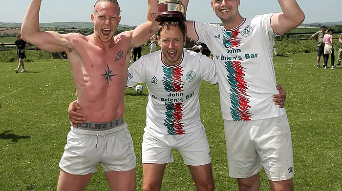 Clonakilty Soccer Club's Conor McKahey, Shane Buttimer and Jonathan Leahy celebrate winning the West Cork League Premier Division title for the first time in June. This followed on from their Beamish Cup success a month earlier.