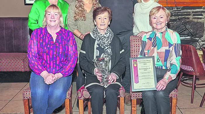 Celebrating receiving the prestigious County Mayor’s Award on behalf of the Dunmanway Christmas Day Swim fundraiser were (front, from left): Karen O’Donovan, Kathleen O’Farrell and Eileen Lyons. Back (from left): Maighread McCarthy, Laurie Hayes, Tim Buckley and Niamh Hayes.  (Photo: Noel M Photography)