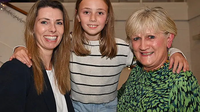 Alva Calnan (centre) with her mum Corinna (left) and her grandmother Mareeta, all from Bandon, at the Bandon camogie club’s fashion show which was held at the Bandon GAA pavilion in memory of Nicola Tobin. All proceeds from the night were in aid of The Alzheimer Society of Ireland and Marymount.                    (Photo: Martin Walsh)