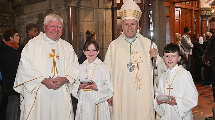 At the visit of the relics of St Bernadette to Clonakilty recently were Fr Tom Hayes; Bishop Fintan Gavin, and altar servers Jane and Niall Keohane from Darrara following mass and the sacrament of the sick in the Church of the Immaculate Conception in Clonakilty.  (Photo: Martin Walsh)