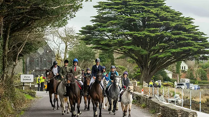 Around 20 horses and ponies took part in the West Cork Cheval in aid of West Cork Jesters, which ran to Ahakista and back last weekend. Above: The cheval makes its way past St James Church in Durrus. The village won first prize in the large village category at the All-Ireland Pride of Place awards ceremony, which was held in Monaghan.(Photo: Andy Gibson).