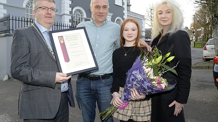 February: Local hero William Ross (second from left), who helped rescue a lady from her car after it had entered the River Lee in November 2023, was honoured at a special event hosted by Sean O’Donovan MCC (left). Also included are Sophia and Geraldine Ross (Photo: Denis Boyle)