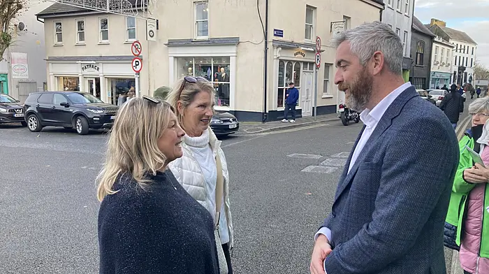 SNA teacher Rebecca Fox from Summercove National School speaking to Christopher O'Sullivan in Kinsale last Saturday during his canvass