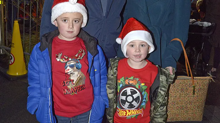 NEWS 24/11/2024 Pictured at Bandon for the arrival of Santa to switch on the Christmas Lights was Garry and Carroline O'Donovan and their children Ross and Jake. Picture Denis Boyle