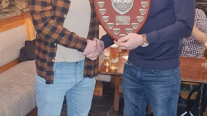 Anthony Nolan (left) presenting Barry Dwyer with the winning DeCourcey Golf Society match-play shield for 2024. The shield is now being named the Ger Nolan Shield in memory of Anthony’s late dad, Ger, who always enjoying golfing with the society.